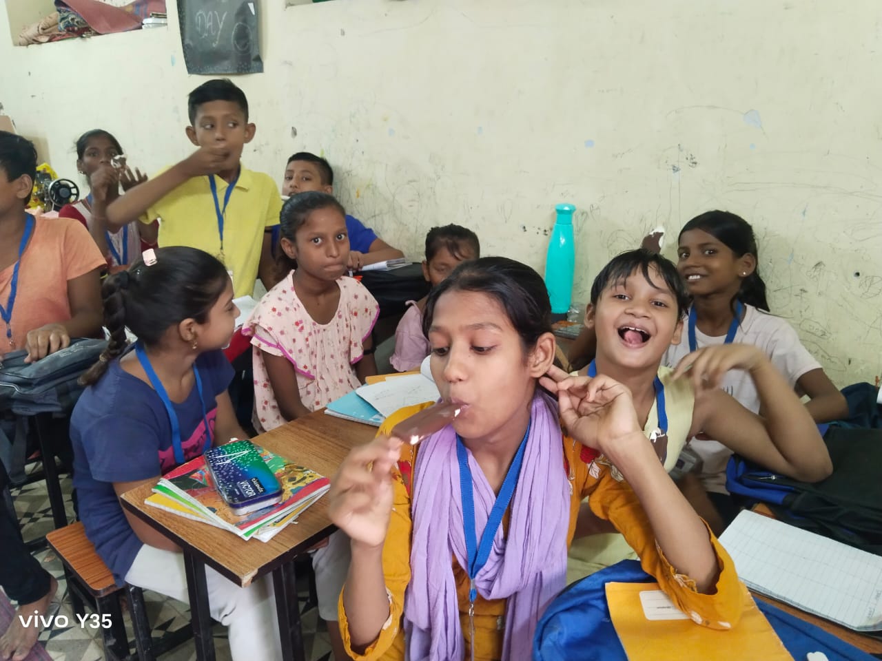 Child receiving educational materials