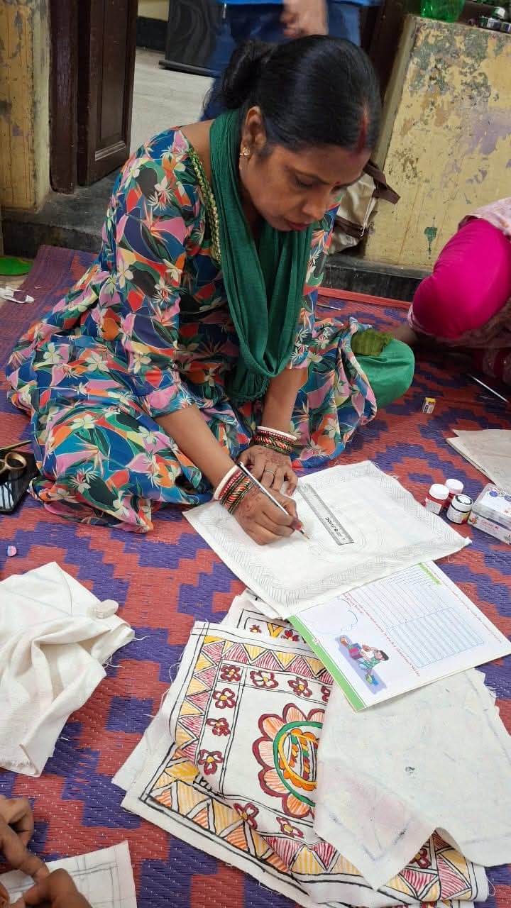 Close-up of hands stitching fabric